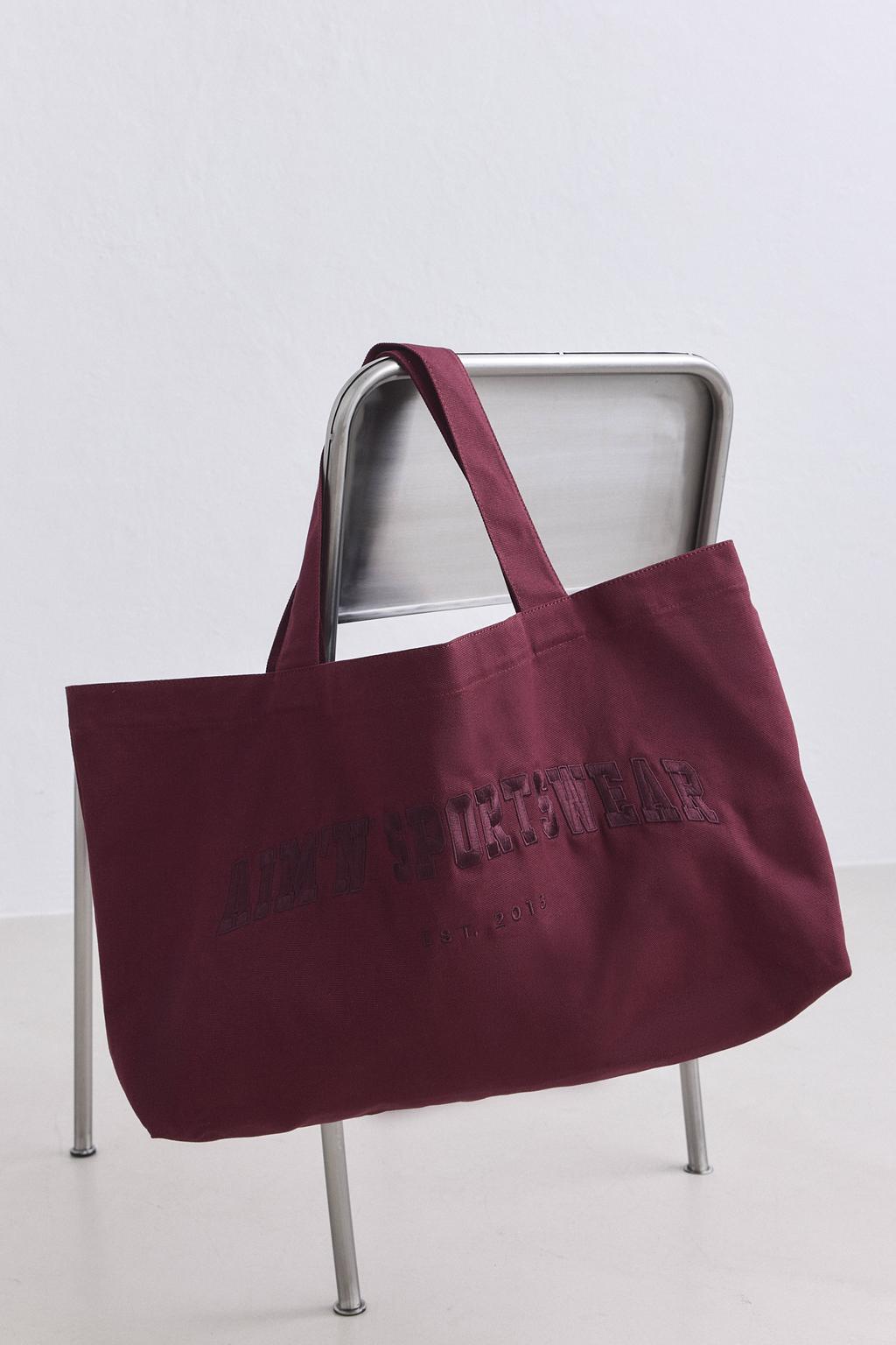 Aim'n katoenen tas met logo - donkerrood