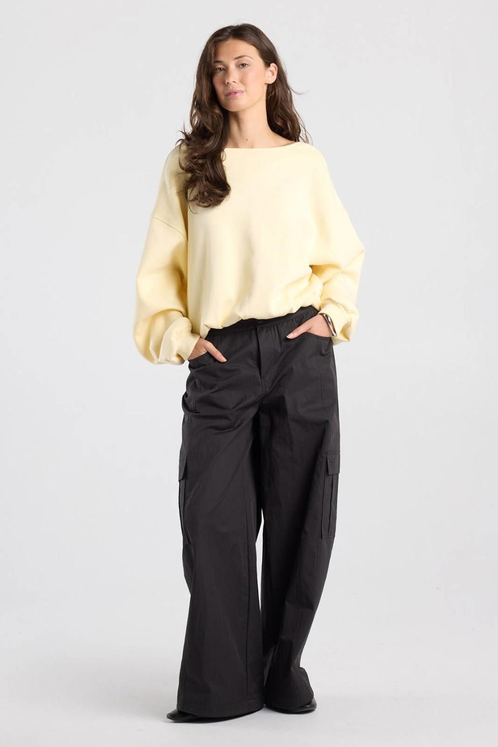 America Today sweater met open rug en plooien - lichtgeel