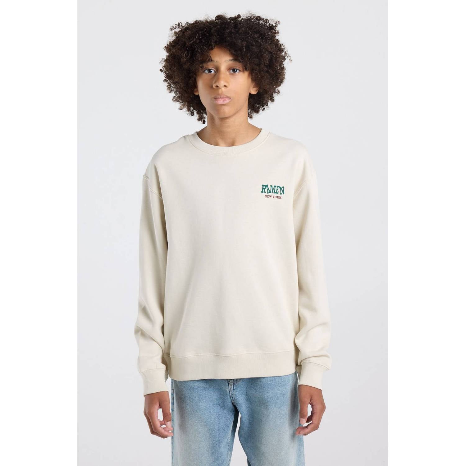 America Today sweater met backprint beige