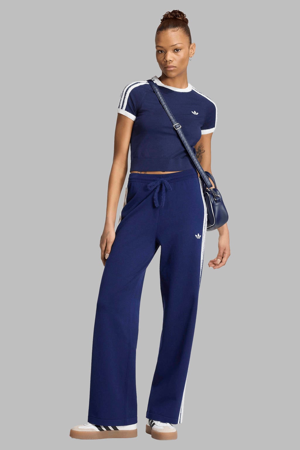 Donkerblauwe dames adidas Originals Firebird knitted broek van viscose met regular fit, elastische tailleband met koord en effen