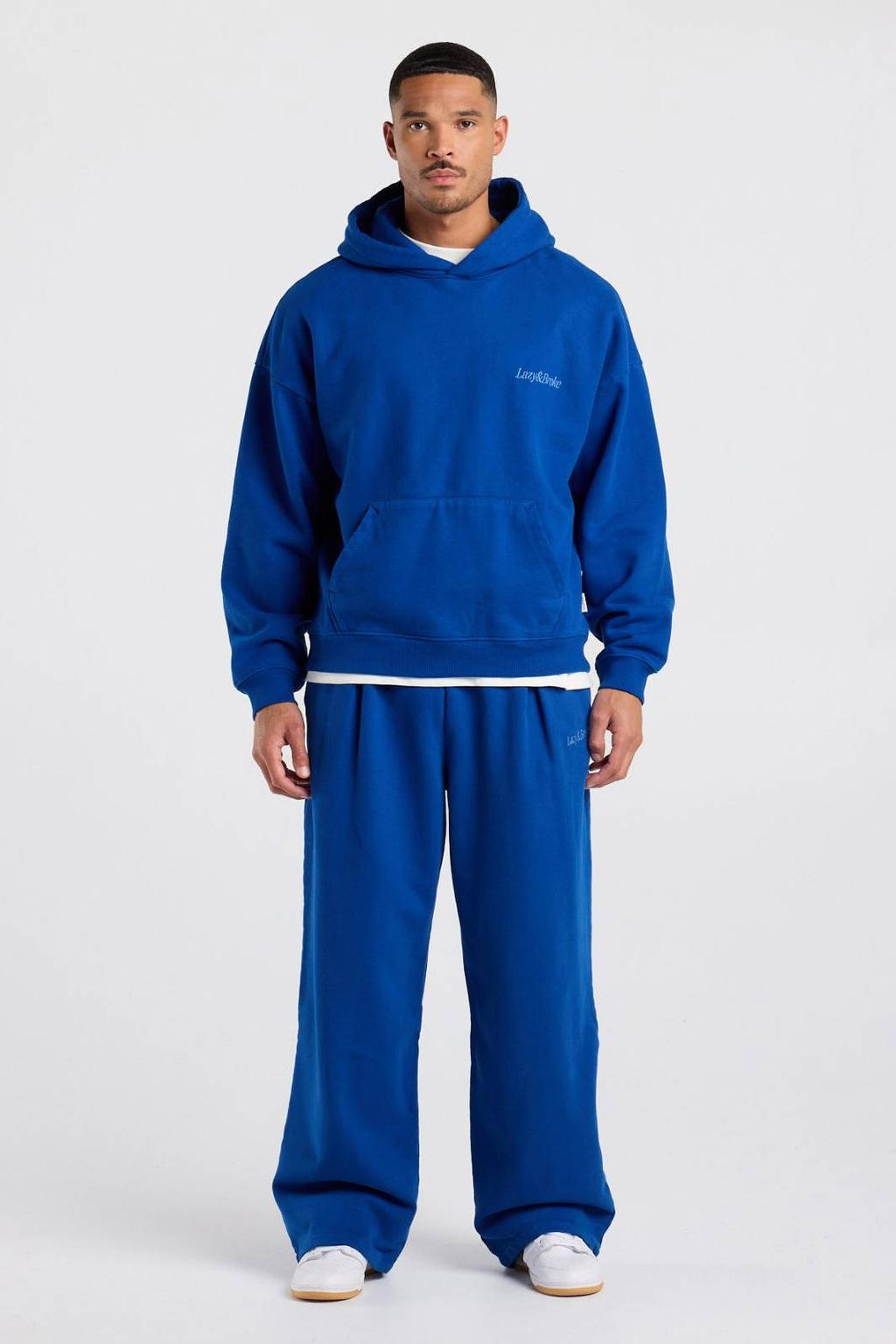 America Today loose fit joggingbroek met borduursels en plooien - kobalt