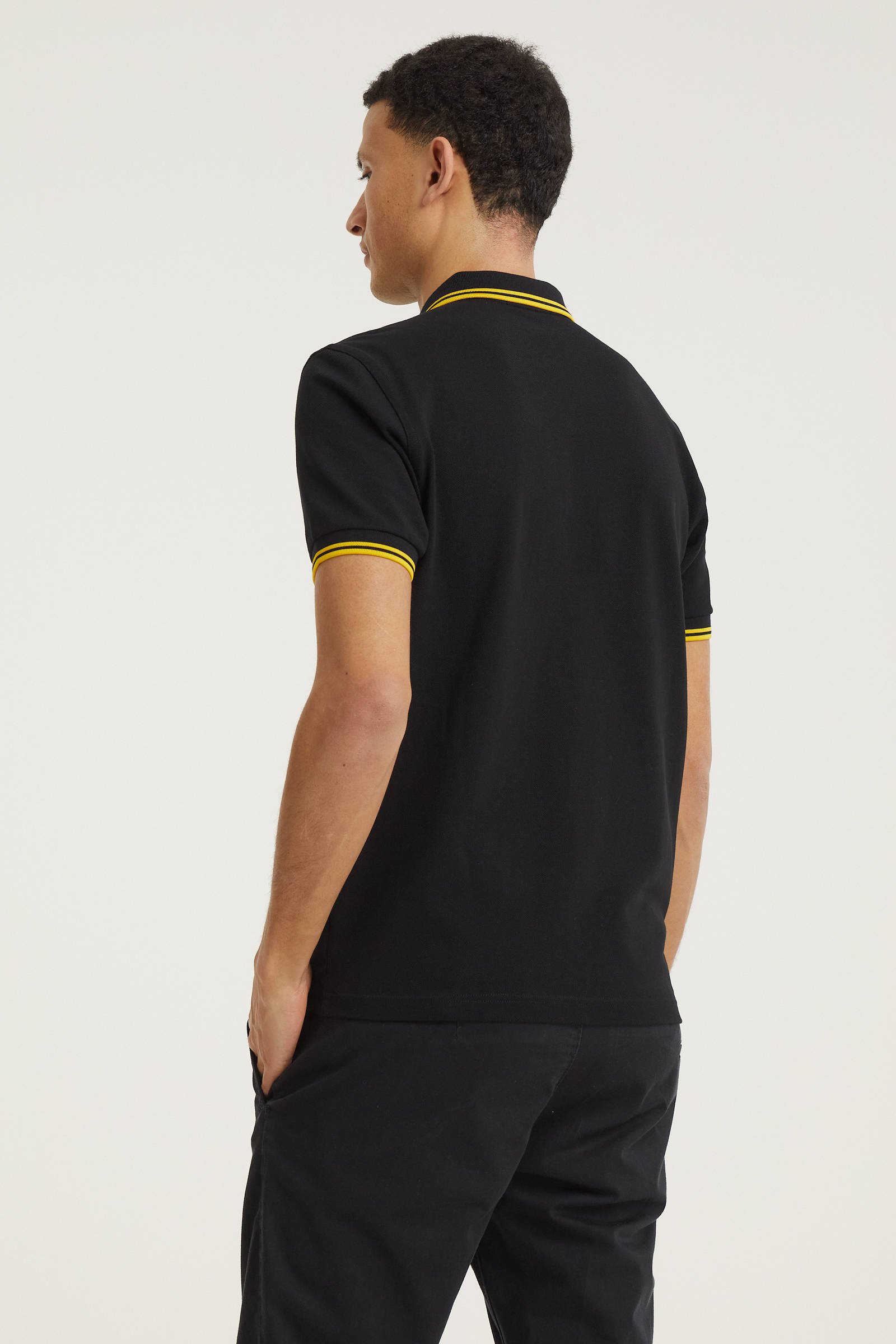 fred perry polo zwart geel