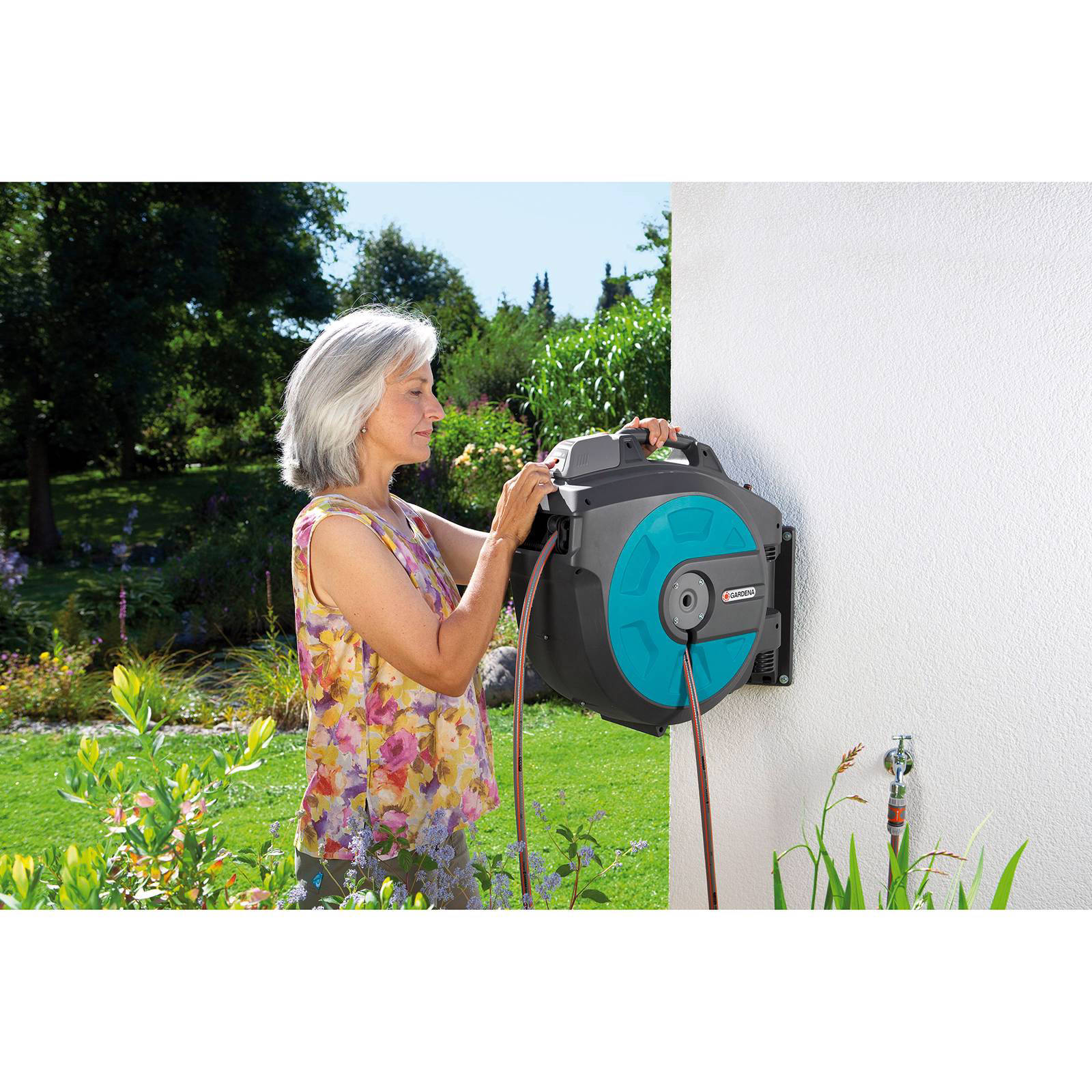50+ Gardena 35 Roll-Up Automatic Li Hornbach, Le dévidoir se fixe